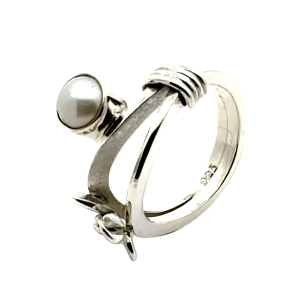 Angled view of the authentic Taxco silver ring showing the wrap-around band design and 925 stamp.