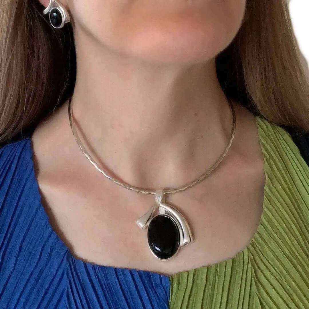 Big Oval Obsidian Pendant In Silver with model - Nueve Sterling