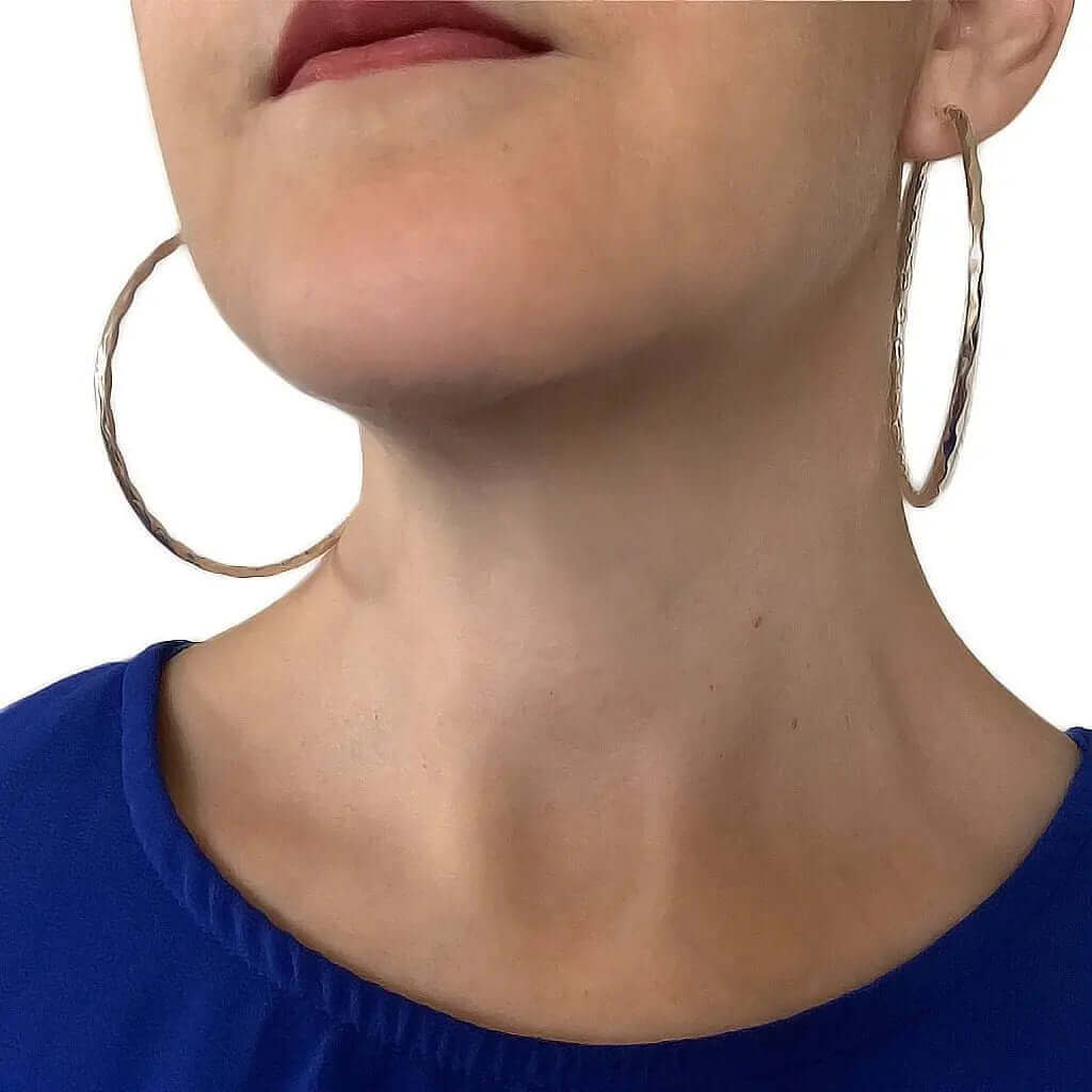 Big Wavy Silver Hoops with model - Nueve Sterling