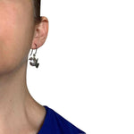 Bird Silver Earrings With Small Stone with model - Nueve Sterling