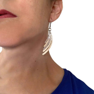 Curved Lines Silver Earrings with model - Nueve Sterling