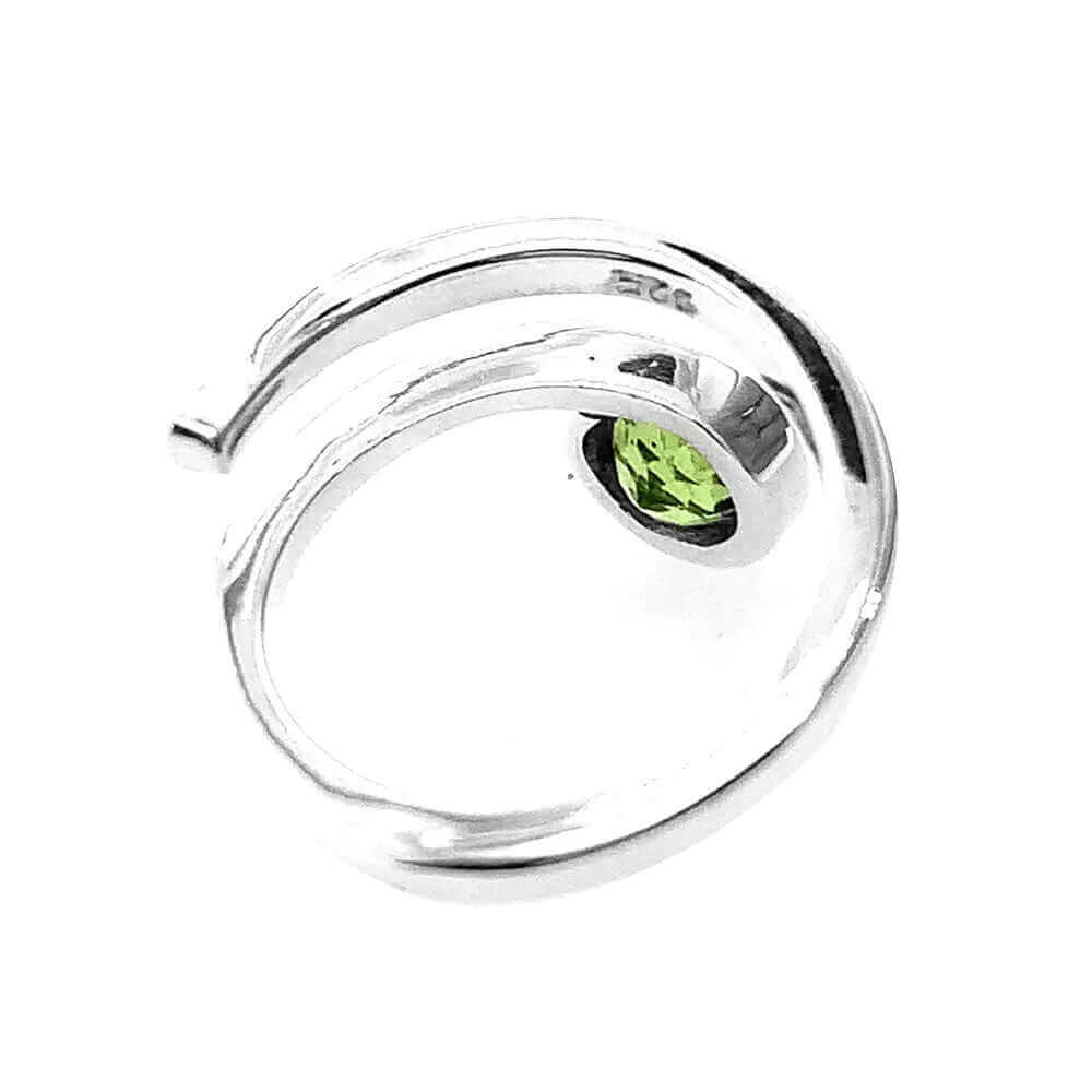    Curved-Silver-Ring-With-Peridot-top-Nueve-Sterling
