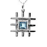     Grid-Silver-Pendant-With-Blue-Topaz-front-Nueve-Sterling