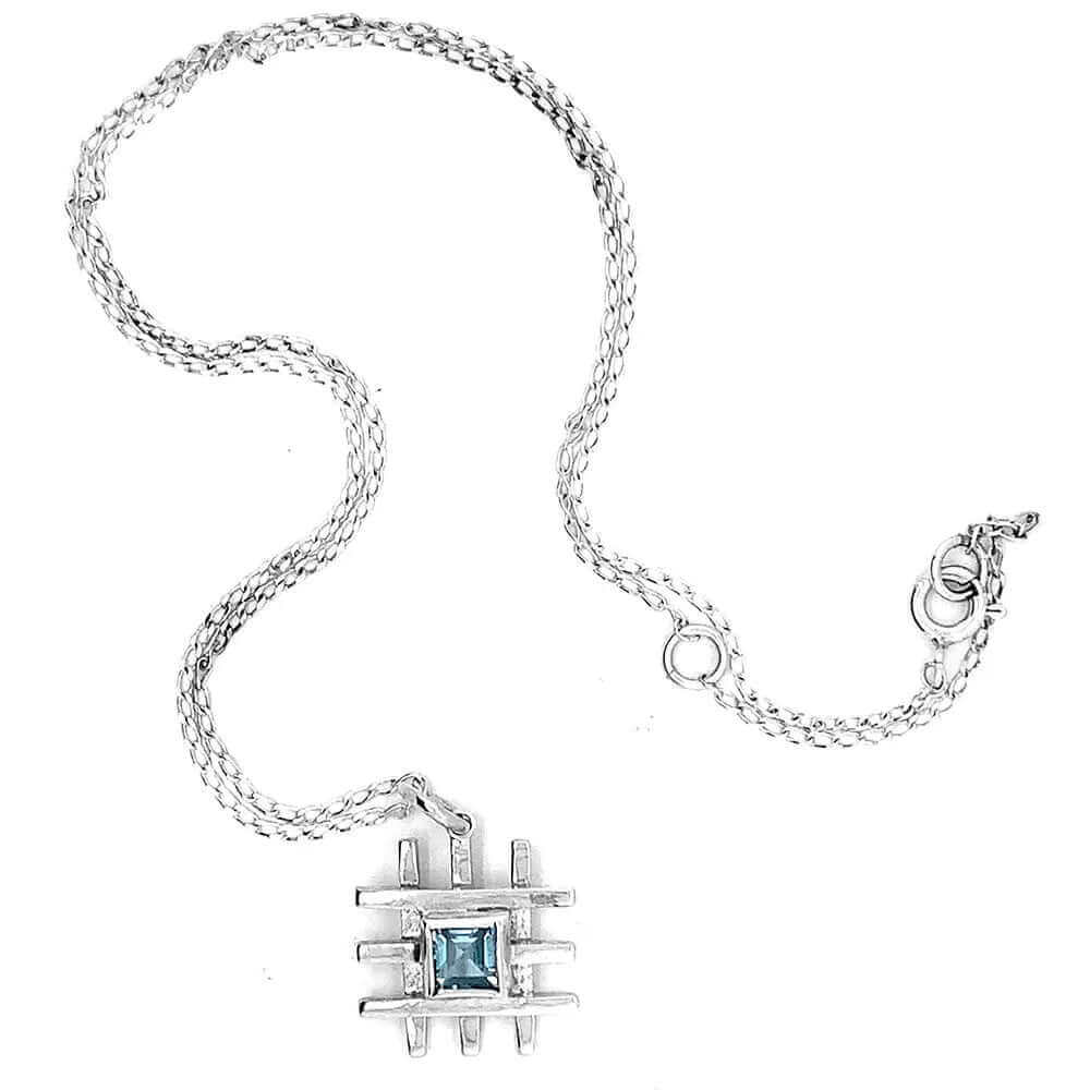    Grid-Silver-Pendant-With-Blue-Topaz-top-Nueve-Sterling