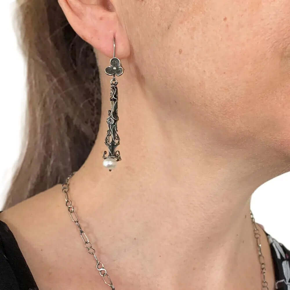 Long Filigree Pearl Oxidized Silver Earrings with model - Nueve Sterling