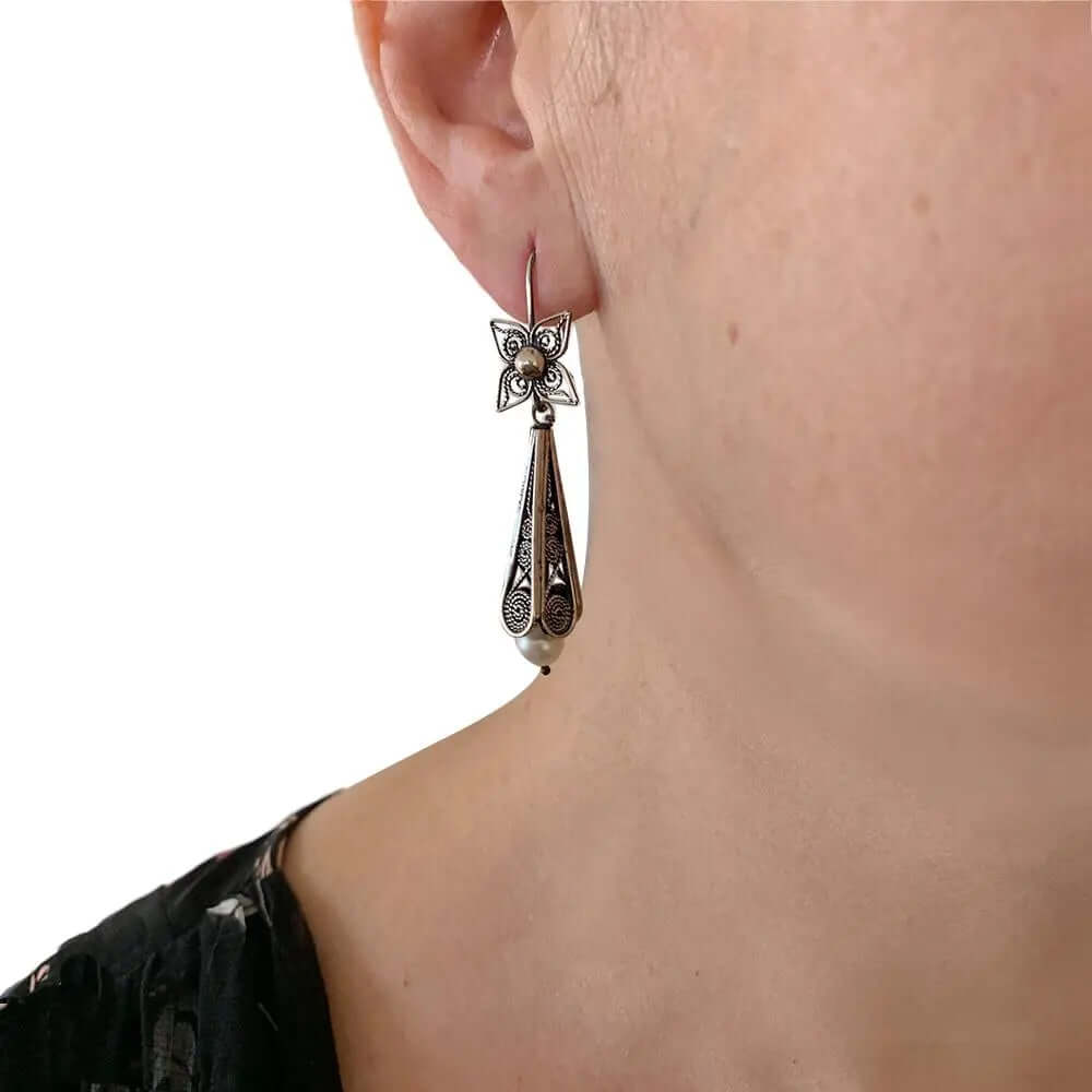 Long Filigree Flower Oxidized Silver Earrings with model - Nueve Sterling