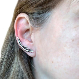 Long-Leaf-Silver-Climber-Earring-with-model-Nueve-Sterling