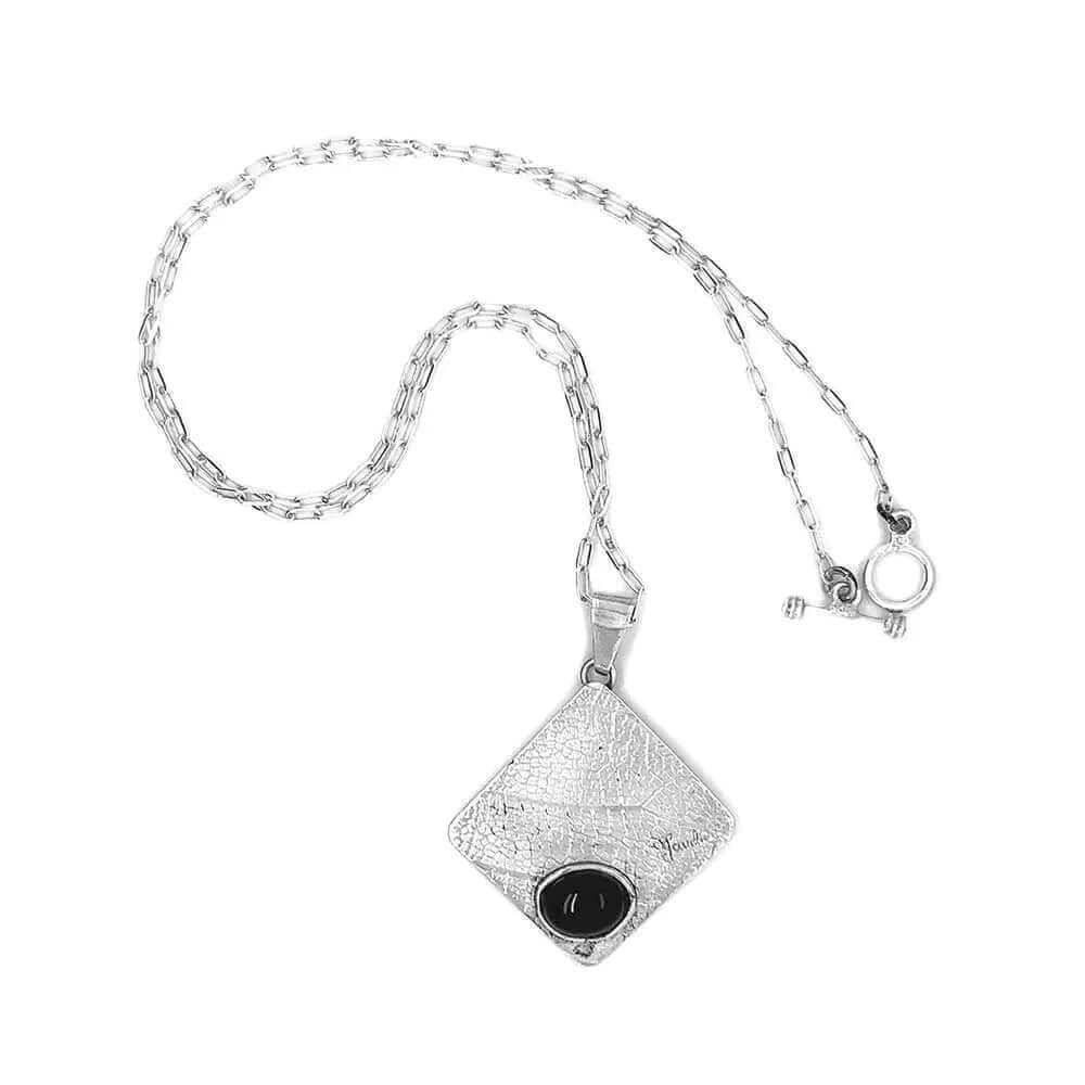 %product Onyx Textured Silver Pendant Nueve Sterling