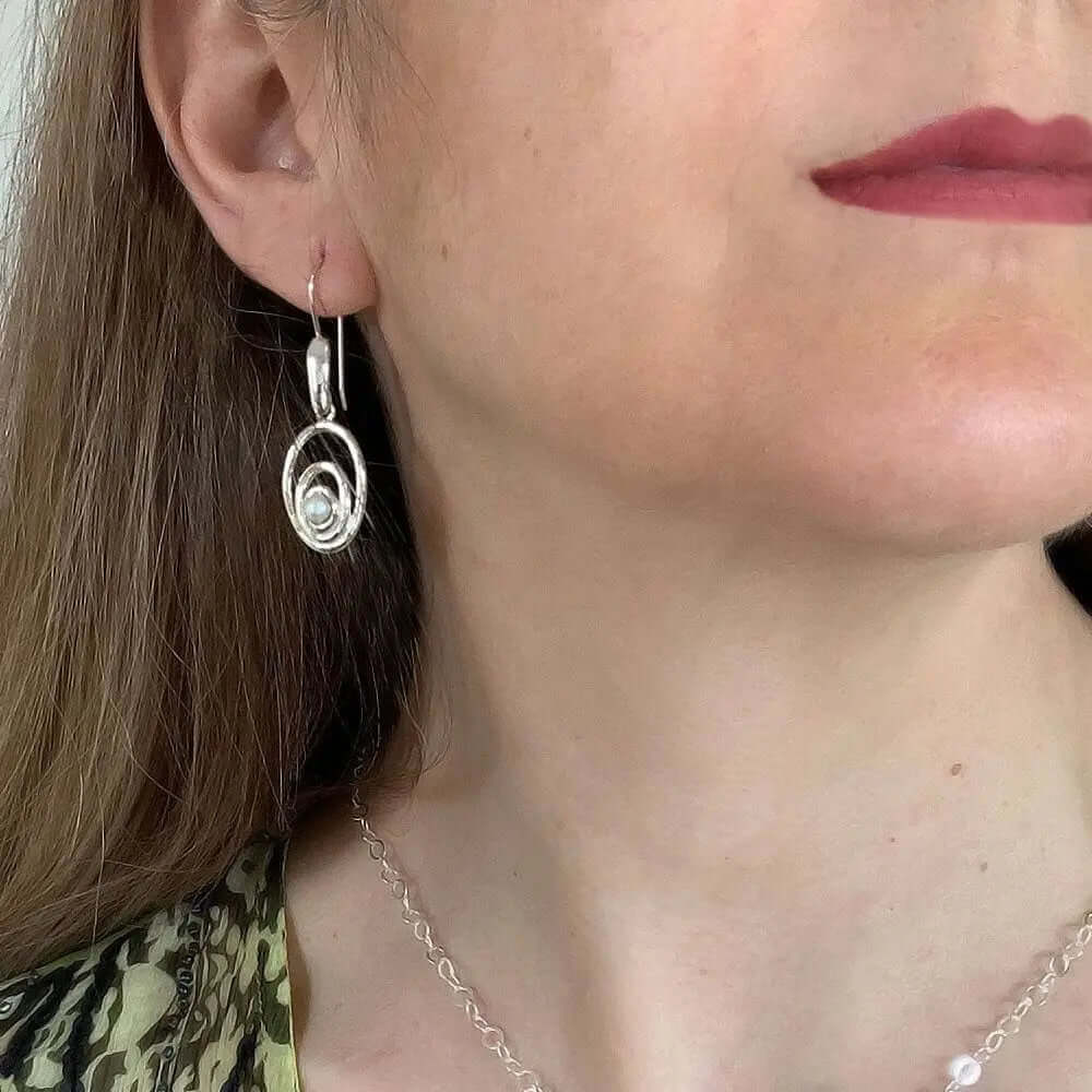 Oval Earrings In Silver With Pearl with model - Nueve Sterling