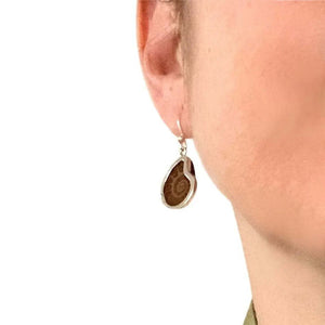 Silver Earrings with Ammonite with model - Nueve Sterling
