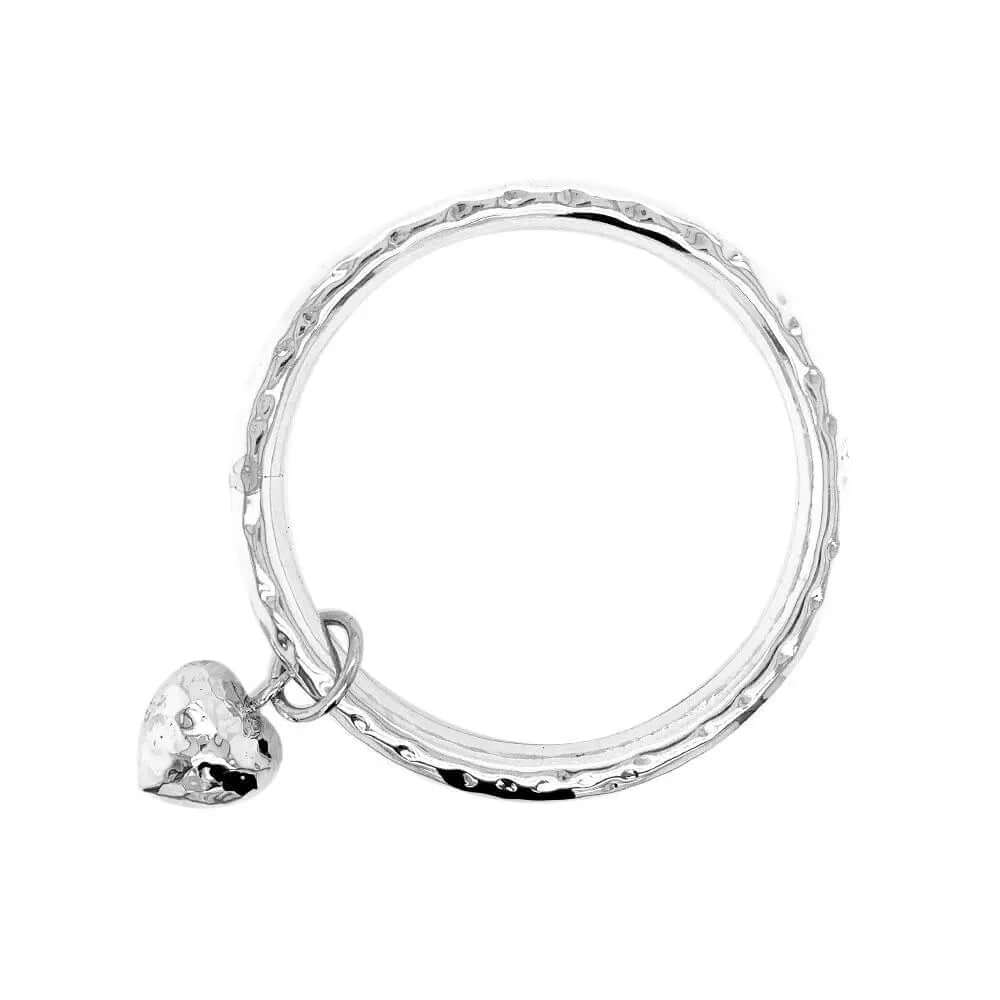 Silver Hammered Bangle With Dangling Heart - Nueve Sterling
