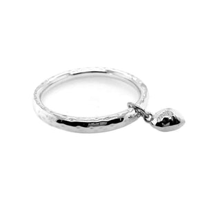 Silver Hammered Bangle With Dangling Heart flat - Nueve Sterling