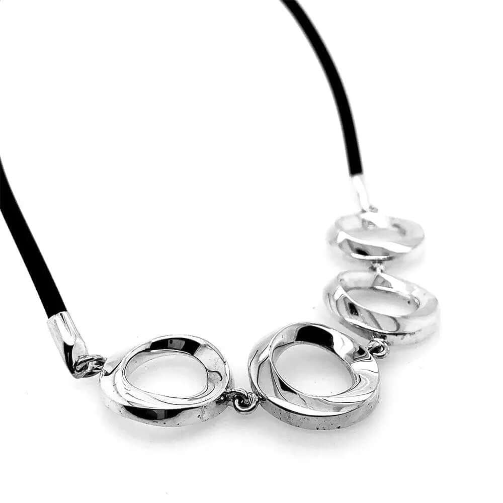 Stylized Circles In Silver Necklace With Rubber detail - Nueve Sterling