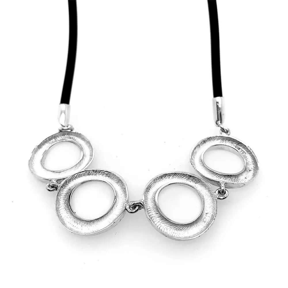 Stylized Circles In Silver Necklace With Rubber back - Nueve Sterling
