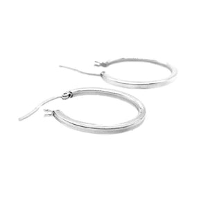 Thin Oval Silver Hoops flat - Nueve Sterling