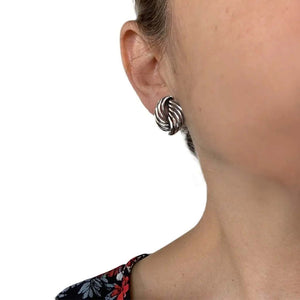 Twirl Silver Earrings with model - Nueve Sterling
