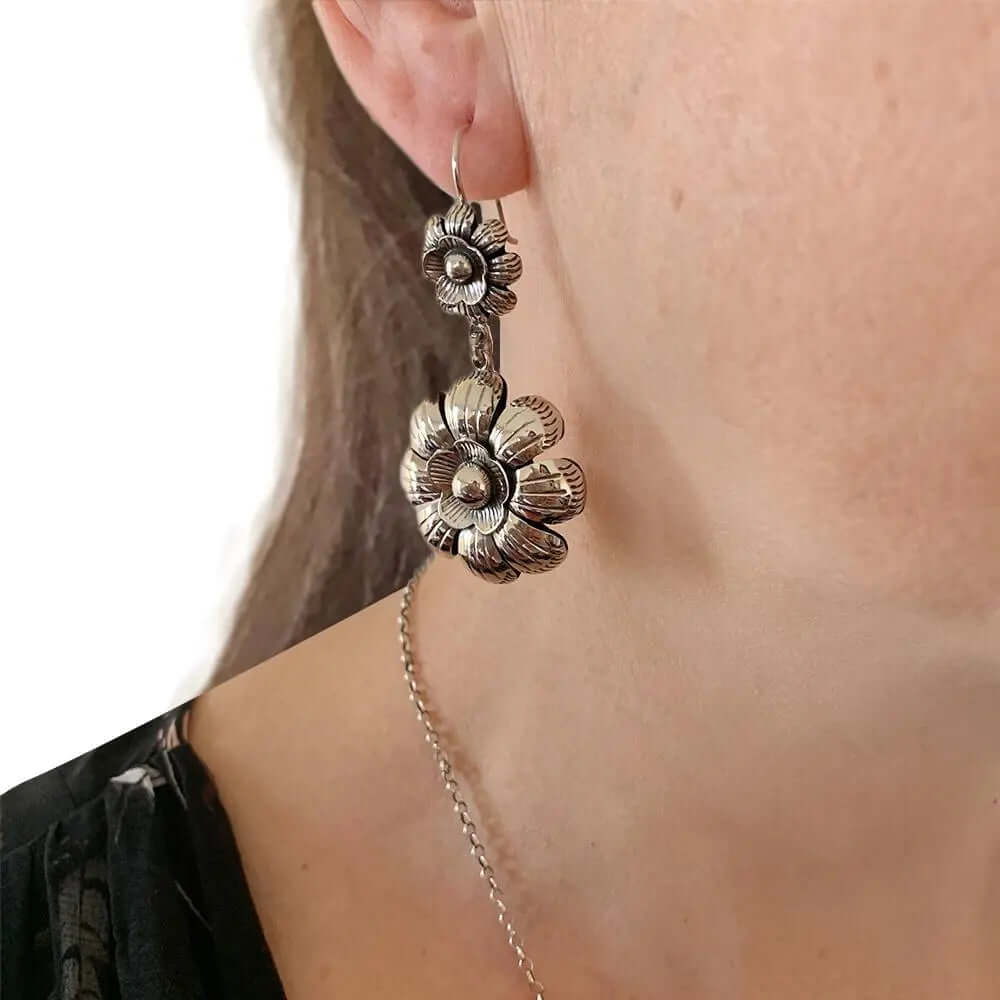 Dangling Flowers Silver Earrings with model - Nueve Sterling