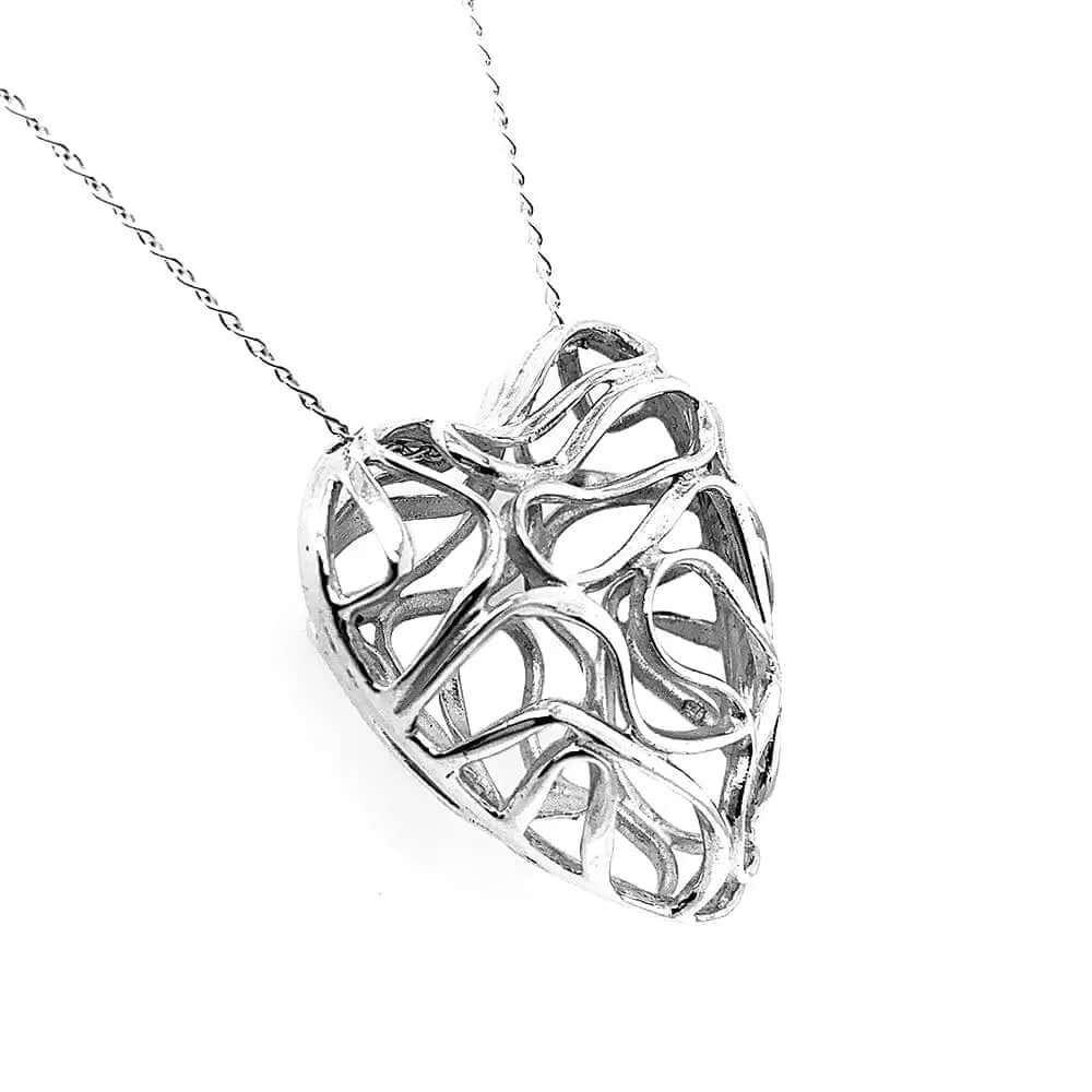 %product Unique Silver Heart Pendant Nueve Sterling