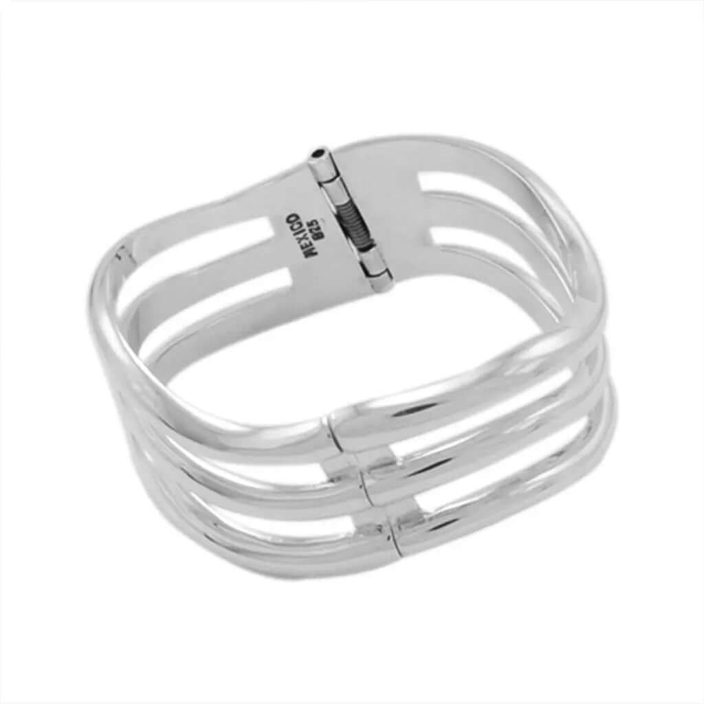 Wavy Lines Silver Clamper - Nueve Sterling