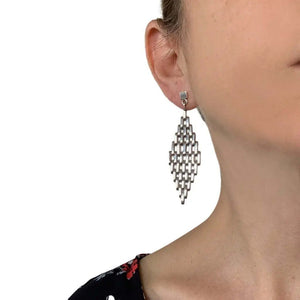 Woven Silver Earrings with model - Nueve Sterling