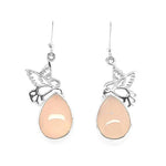 Front view of handmade 925 sterling silver drop earrings featuring detailed hummingbird motifs and oval rose quartz stones.